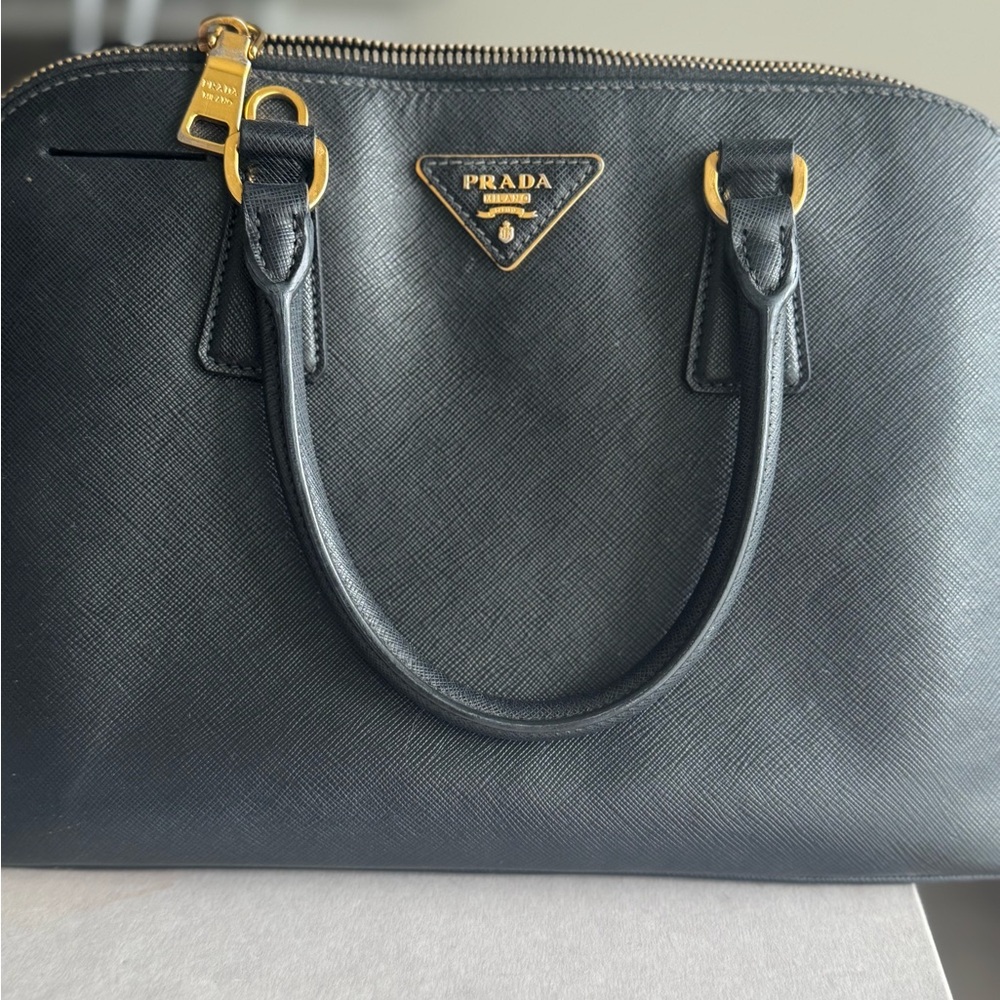 Prada Black Leather Handbag with Gold Accents